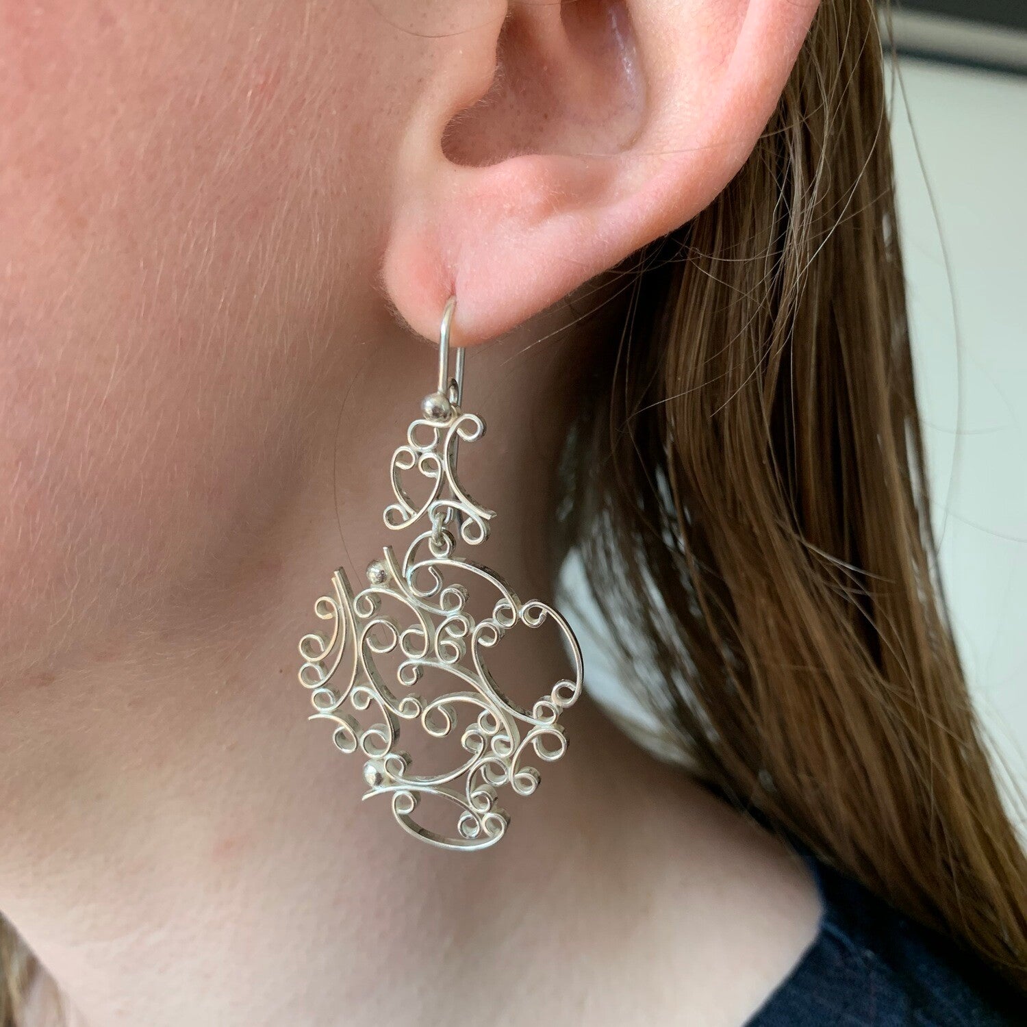Filagree silver earrings.